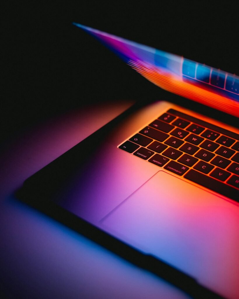 Laptop screen showing vibe coding in progress