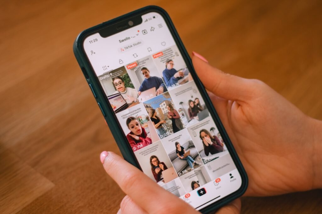 Person scrolling a social media feed, illustrating the AI slop backlash