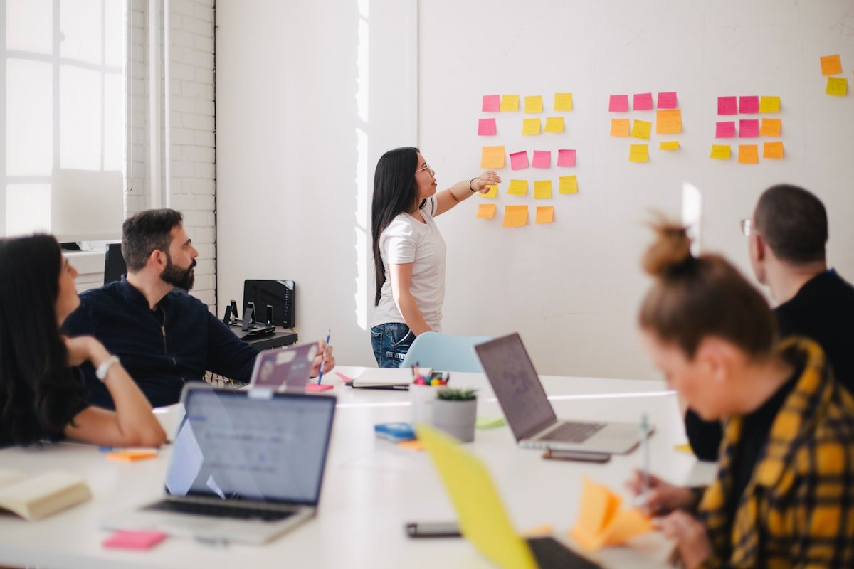 Business team discussing charts, representing the AI agents trust gap