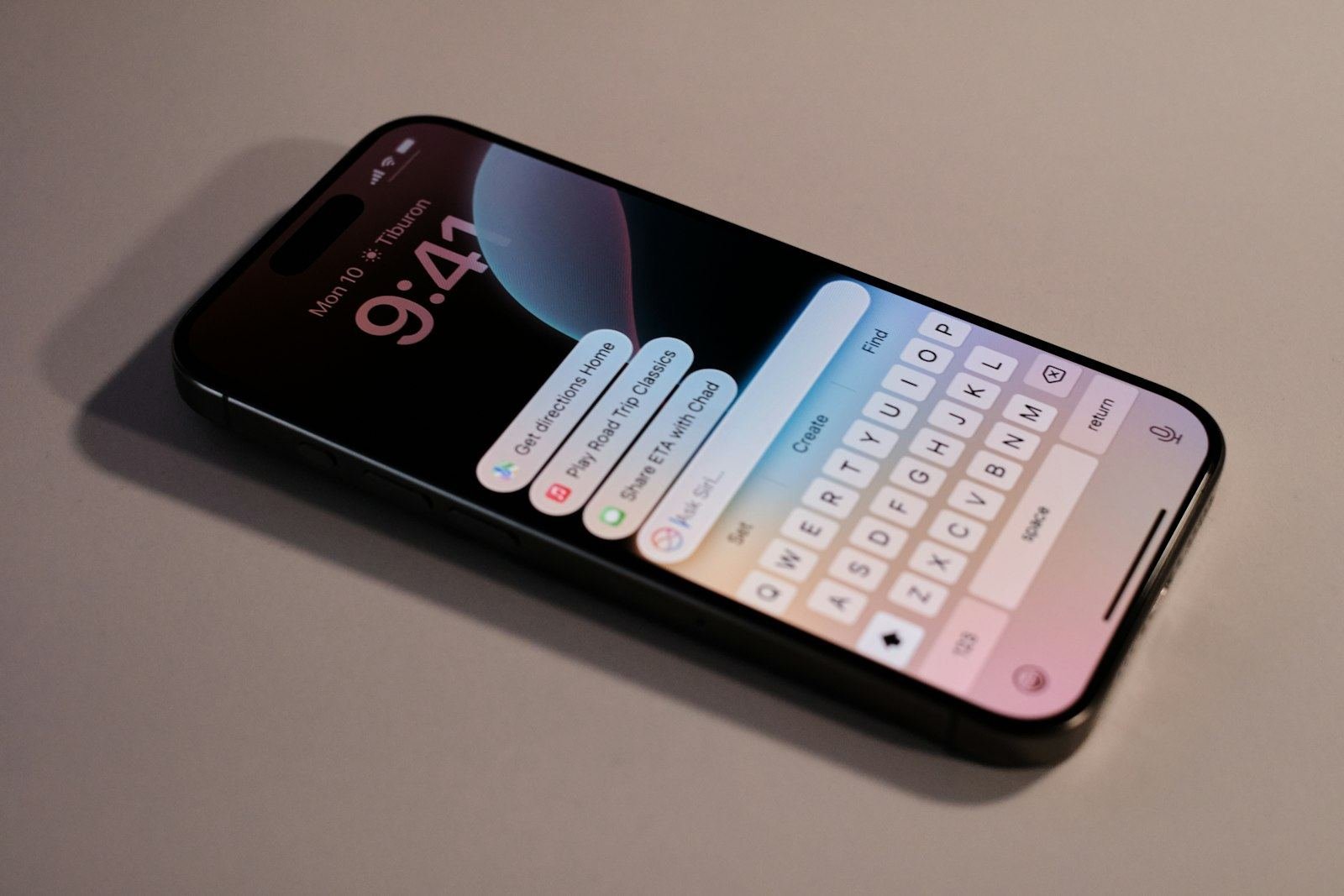Close up of an iPhone showing Siri, related to the Apple Siri settlement over delayed Apple Intelligence features
