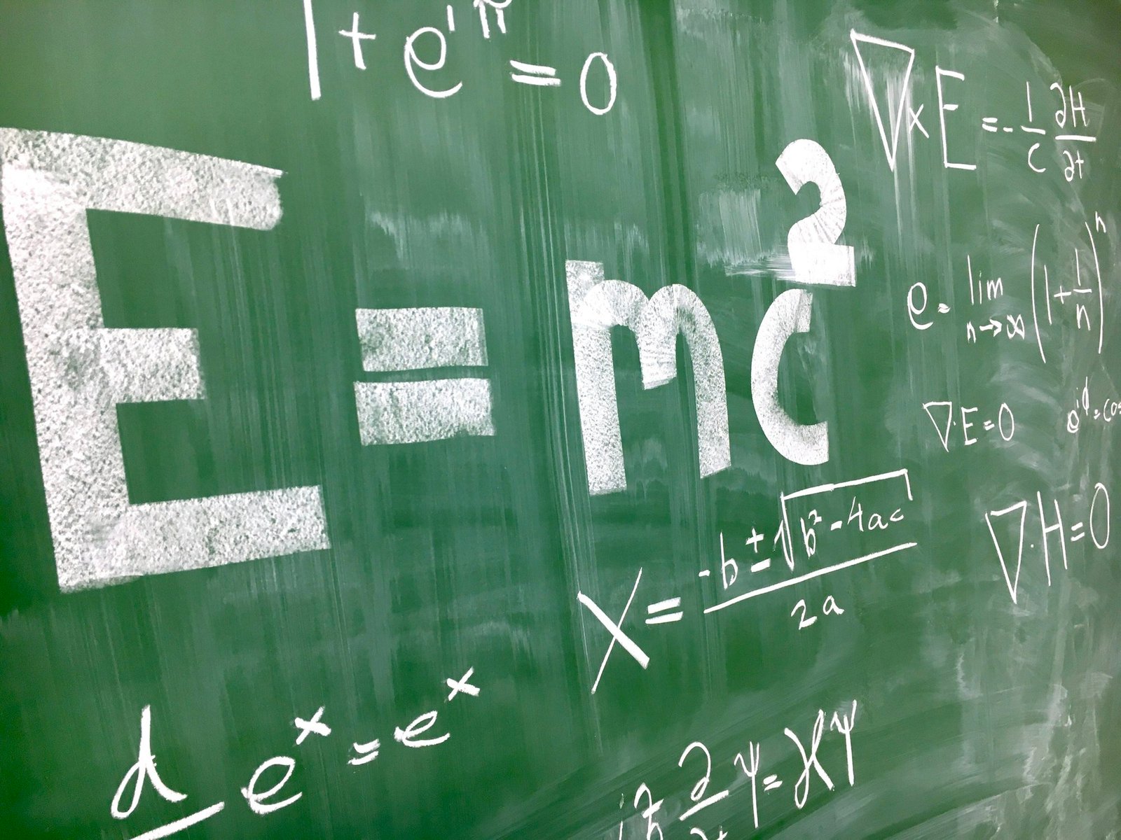 Math equations written on a chalkboard, representing Claude's formal proof of Fermat's Last Theorem