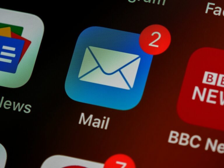 Close-up of a mail app icon on a phone, representing Google’s new Gmail Live AI voice feature
