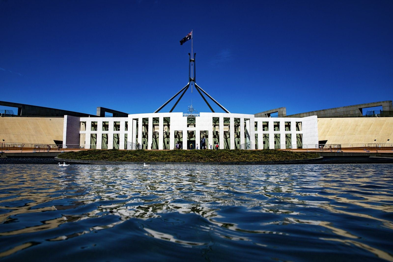 Australian Parliament House in Canberra, the setting for the OpenAI Australia breach warning from PM Albanese
