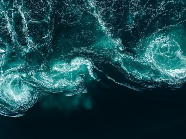 Turbulent swirling water, representing the fluid dynamics equations at the center of the OpenAI Navier-Stokes proof